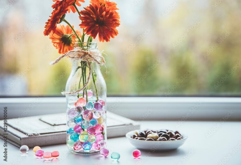 Comment utiliser des billes d'eau pour le bien-être de vos plantes 17 billes deau colorees dans un pot de fleurs